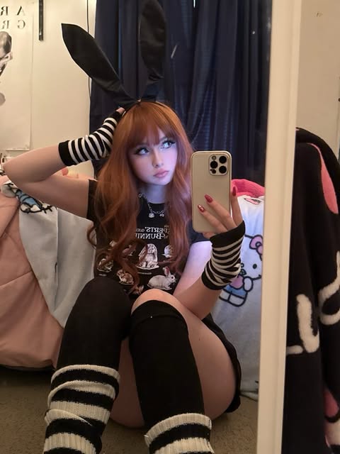 Julie wearing a black bunny-inspired alternative costume